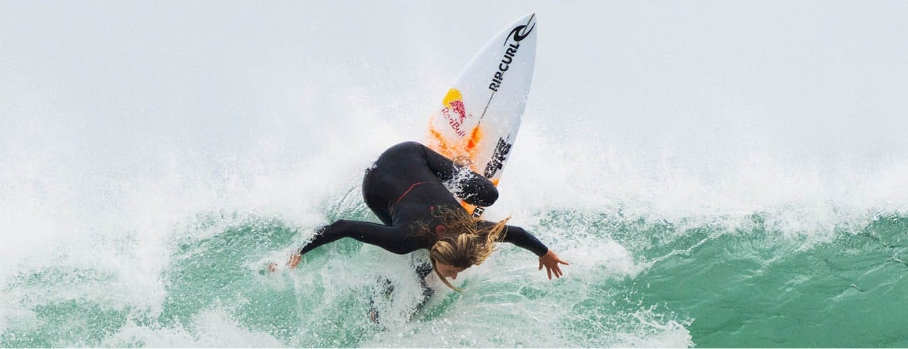 Split image of Teresa Bonvalot and Pam Burridge surfing